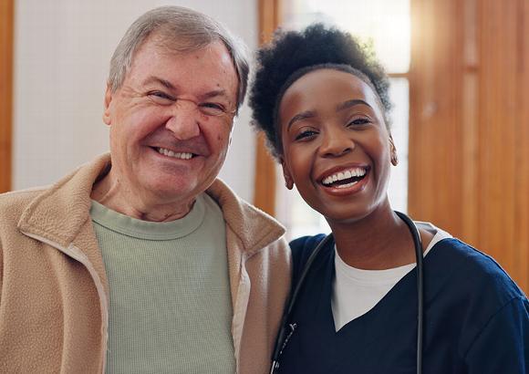 Carer with elderly man